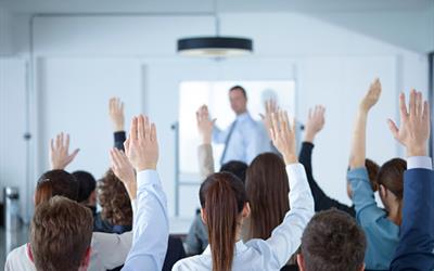 Presentation Photo Businessman giving presentation at a meeting